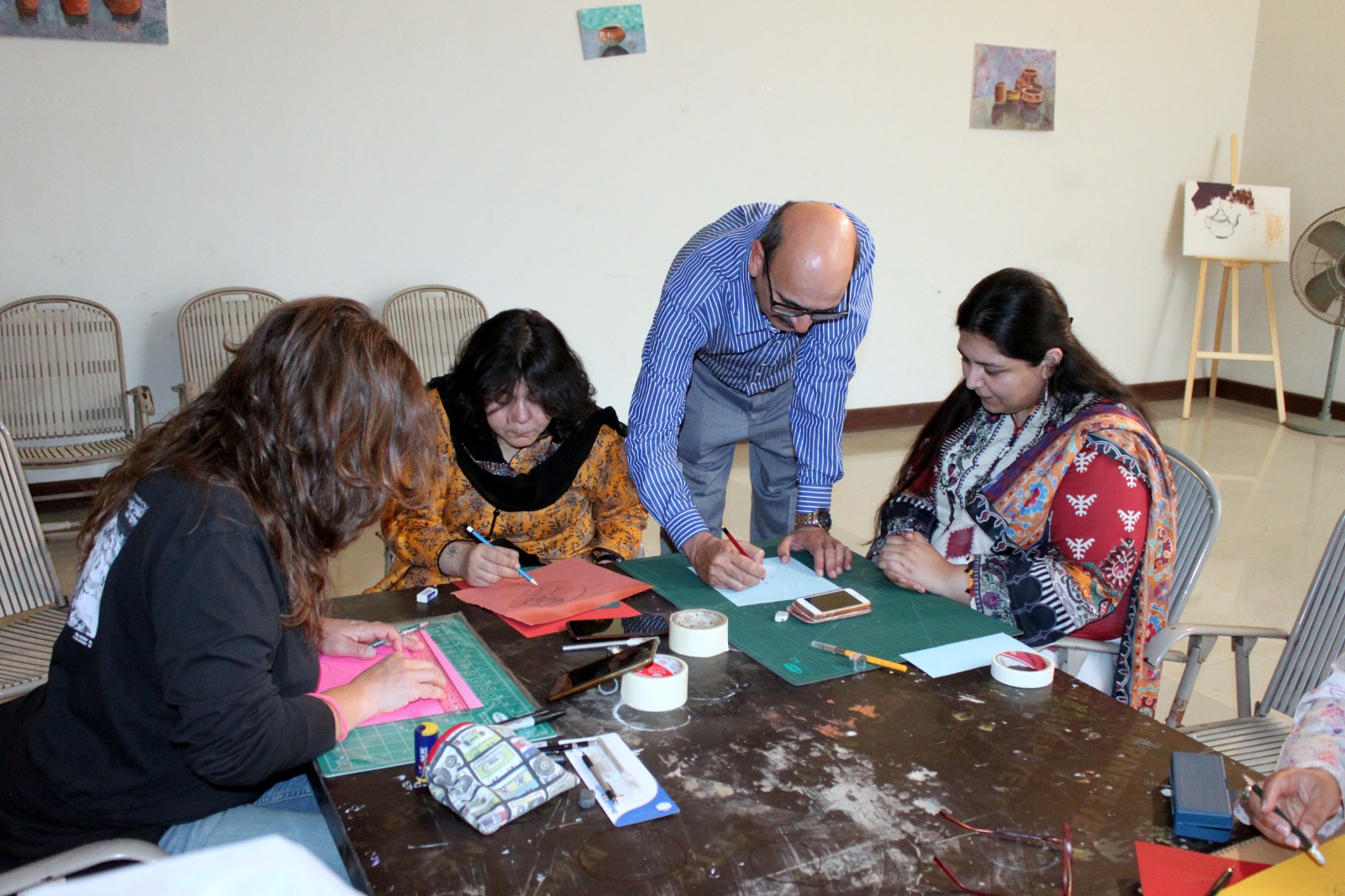 Group workshop session with Tusif Ahmad and participants